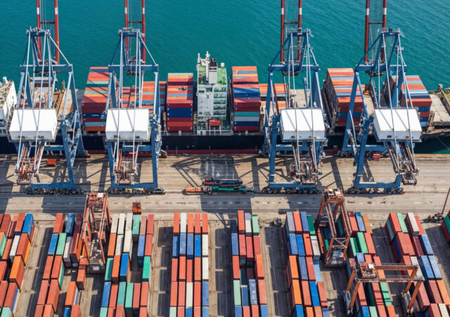 aerial-view-cargo-port-with-shipping-containers-cranes